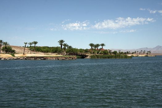 lake with shore and houses