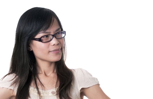 An confused female with black glasses and blak hair with hands on her hips against white background