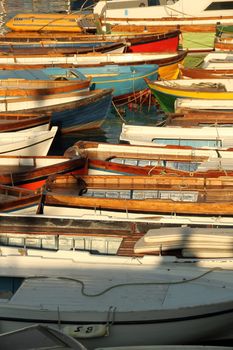 Detail of many small boats in a harbor