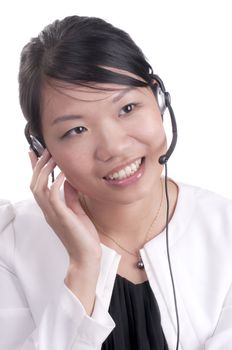 Asian customer service representative on headset phone with client