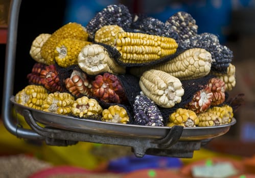 Different types of corn on a market in Peru