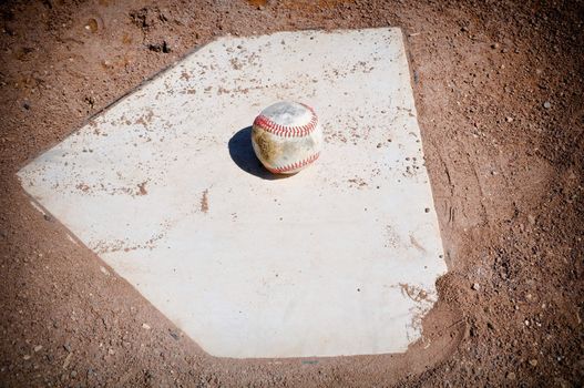 Old Baseball Close Up on Home Plate