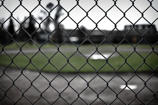 Background of a Baseball Diamond through a chain link fence