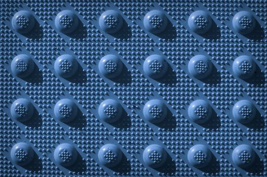 Blue Repeating Knob Pattern used as a background to add text