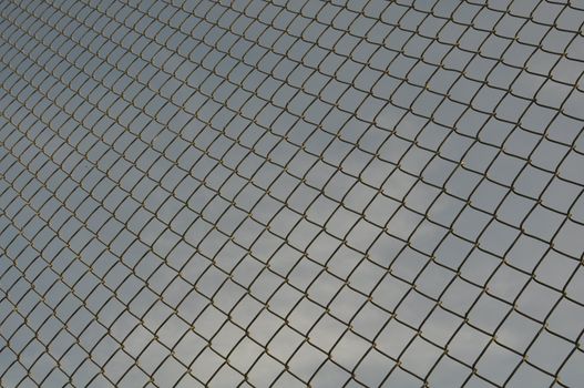 Chain Link Fence and blue sky Background