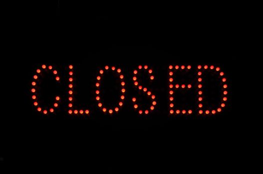 Closed Red Neon Sign with Black Background