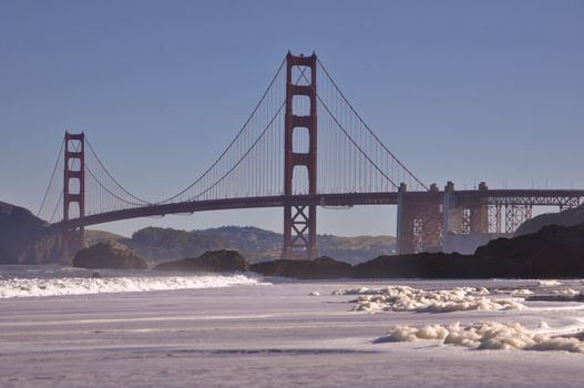 Golden Gate Bridge from Baker Beach with Waves Crashing