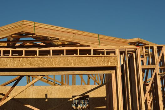 New Home Construction Frame with Blue Sky