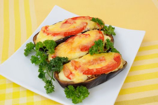 Stuffed eggplant with tomato and cheese