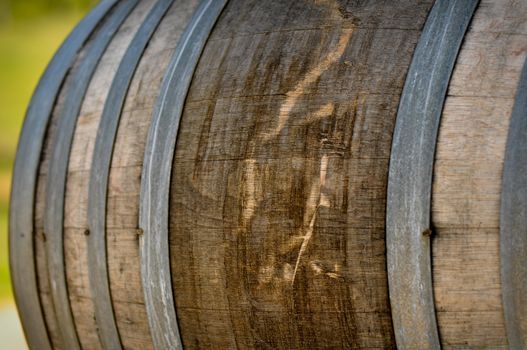 Wine Barrel with Vineyard in Background