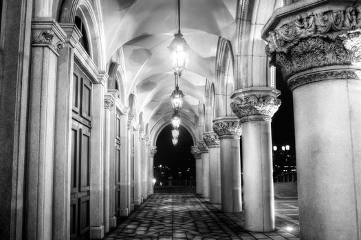 Architecture of hallway with lamp in night.