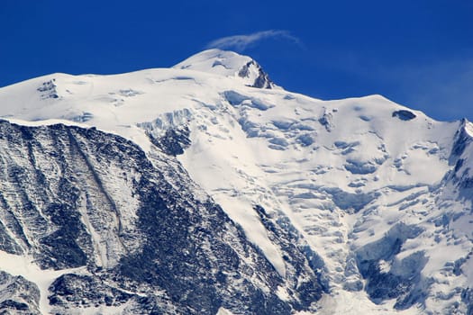 Snowy peak in the Mont-Blanc massif mountain by beautiful weather, France