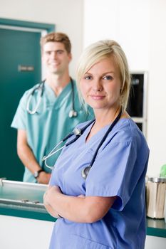 A portrait of a vet and assistant in a small animal clinic