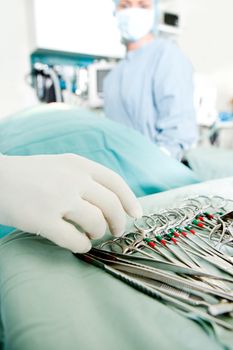 A detail close up of surgery instruments in a sterile environment