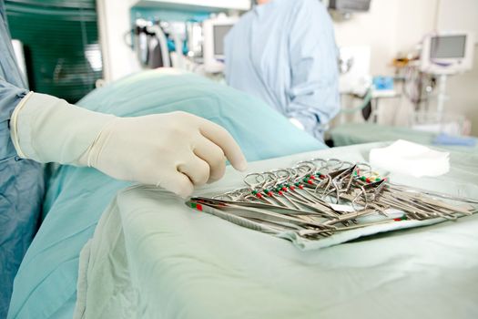 A detail image of sterile surgery instruments in an operation room