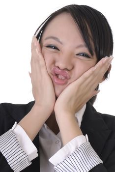 Young business woman with wry face on white background.