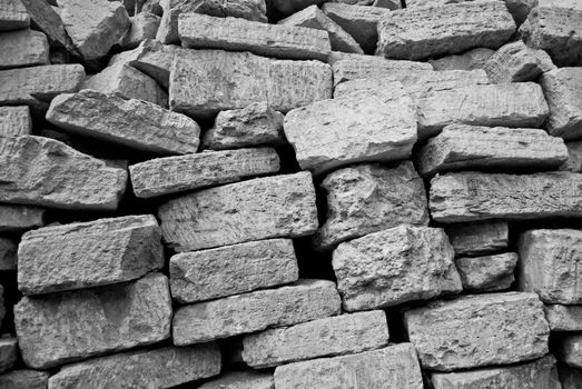 Gray pile of bricks at a construction site