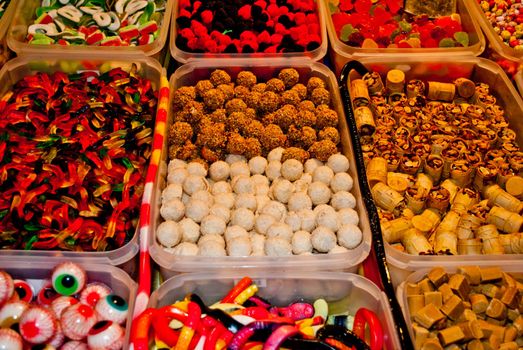 Assorted and colorful candies in a candy store.