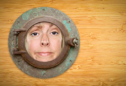 Antique Porthole on Bamboo Wall with Funky Woman Looking Through the Window.