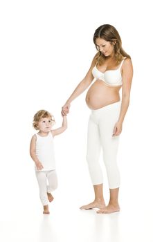 Pregnant woman with her daughter isolated on white background