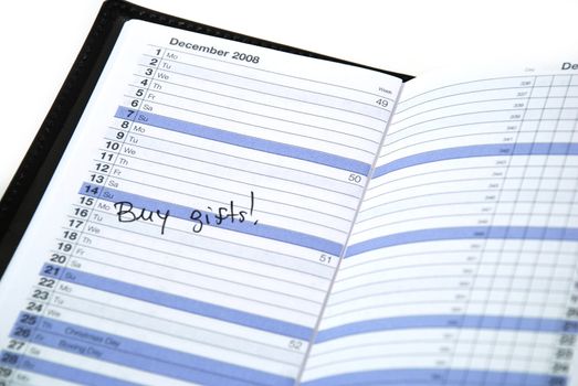 daily planner showing that is time to buy gifts