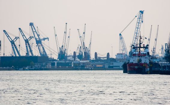 View on Rotterdam harbour and industry from the riverside