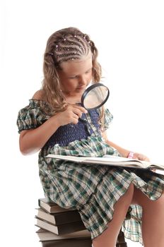 Cute girl holding magnifying glass, isolated on white background  