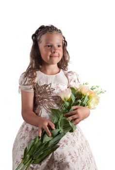 Cute little girl with pigtail hairstyle holding flowers, isolated on white background 