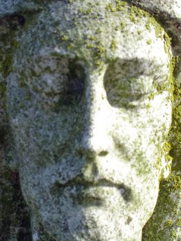 Jesus Statue inside a cemetary - face view