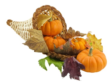 Cornucopia with pumpkins and autumn leaves isolated on white