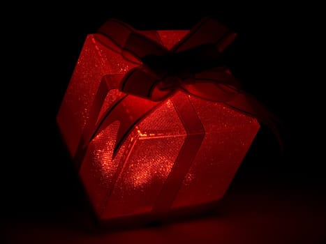 Glowing red christmas present