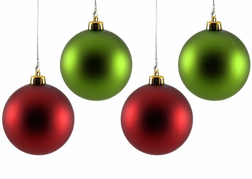 Two red and two green christmas ornaments isolated on white