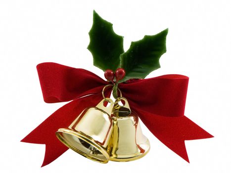 Christmas bells, holly and a red bow isolated on white