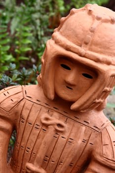 Japanese Haniwa Doll in a garden