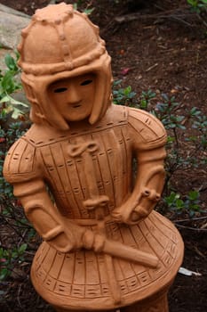 Japanese Haniwa Doll in a garden