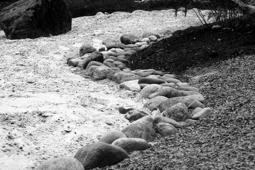 black and white photograph of a stone pathway