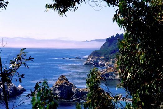 Big Sur is a sparsely populated region of the central California, United States coast where the Santa Lucia Mountains rise abruptly from the Pacific Ocean. The terrain offers stunning views, making Big Sur a popular tourist destination.