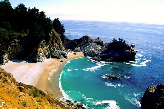 Big Sur is a sparsely populated region of the central California, United States coast where the Santa Lucia Mountains rise abruptly from the Pacific Ocean. The terrain offers stunning views, making Big Sur a popular tourist destination.