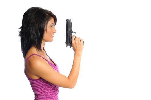 attractive hispanic woman profile holding a pistol on a white background