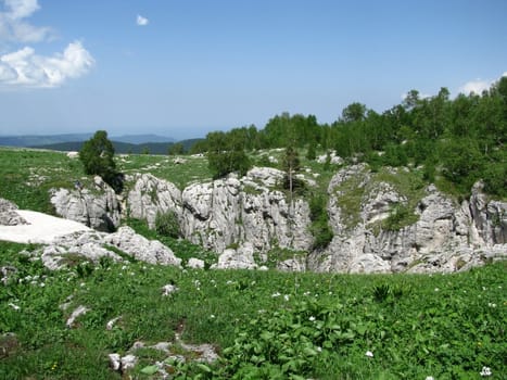 Rock, stone, block, rocky, the main Caucasian ridge; relief; a landscape; a hill; a panorama; mountains; Caucasus; a slope