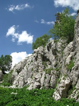 Rock, stone, block, rocky, the main Caucasian ridge; relief; a landscape; a hill; a panorama; mountains