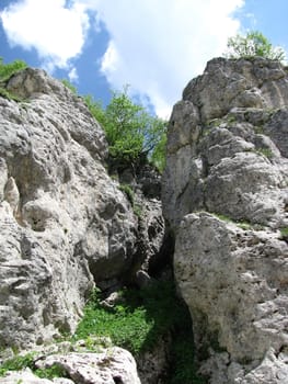 Rock, stone, block, rocky, the main Caucasian ridge; relief; a landscape; a hill; a panorama; mountains; Caucasus