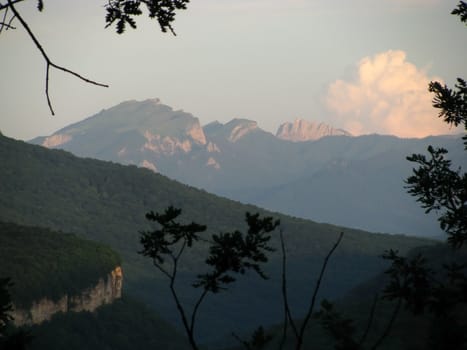 Greens, the Caucasian ridge, rocks; a relief; a landscape; a hill; a panorama; mountains, Caucasus; mountain; a slope; clouds