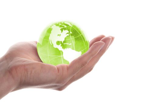 environmental protection or business concept with glass globe in hand isolated on white