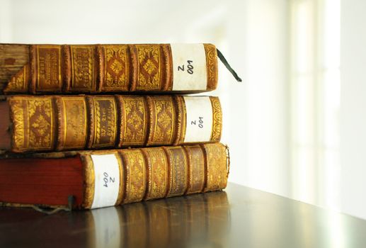 books in a library bookshelf for university education