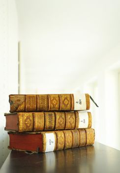 old yellow vintage books in library showing education concept