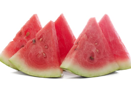 Five pieces of watermelon isolated over white.