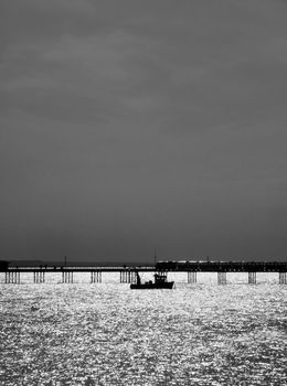 A boat that is by the pier in Southend.
