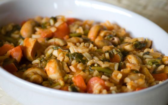 Risotto with mushroom, carrot and greenness.