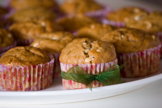 Hazelnut muffins on plate.